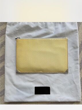 Alexander Wang butter yellow snakeskin clutch